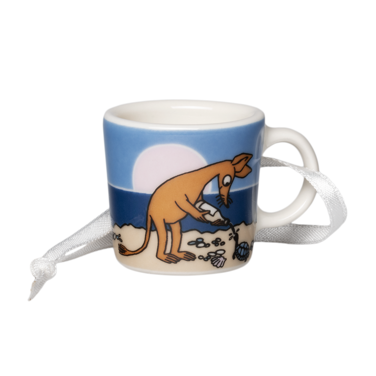 A white ceramic mini mug featuring a cartoon illustration of Sniff on a beach under a blue sky, with a white ribbon tied to the handle.
