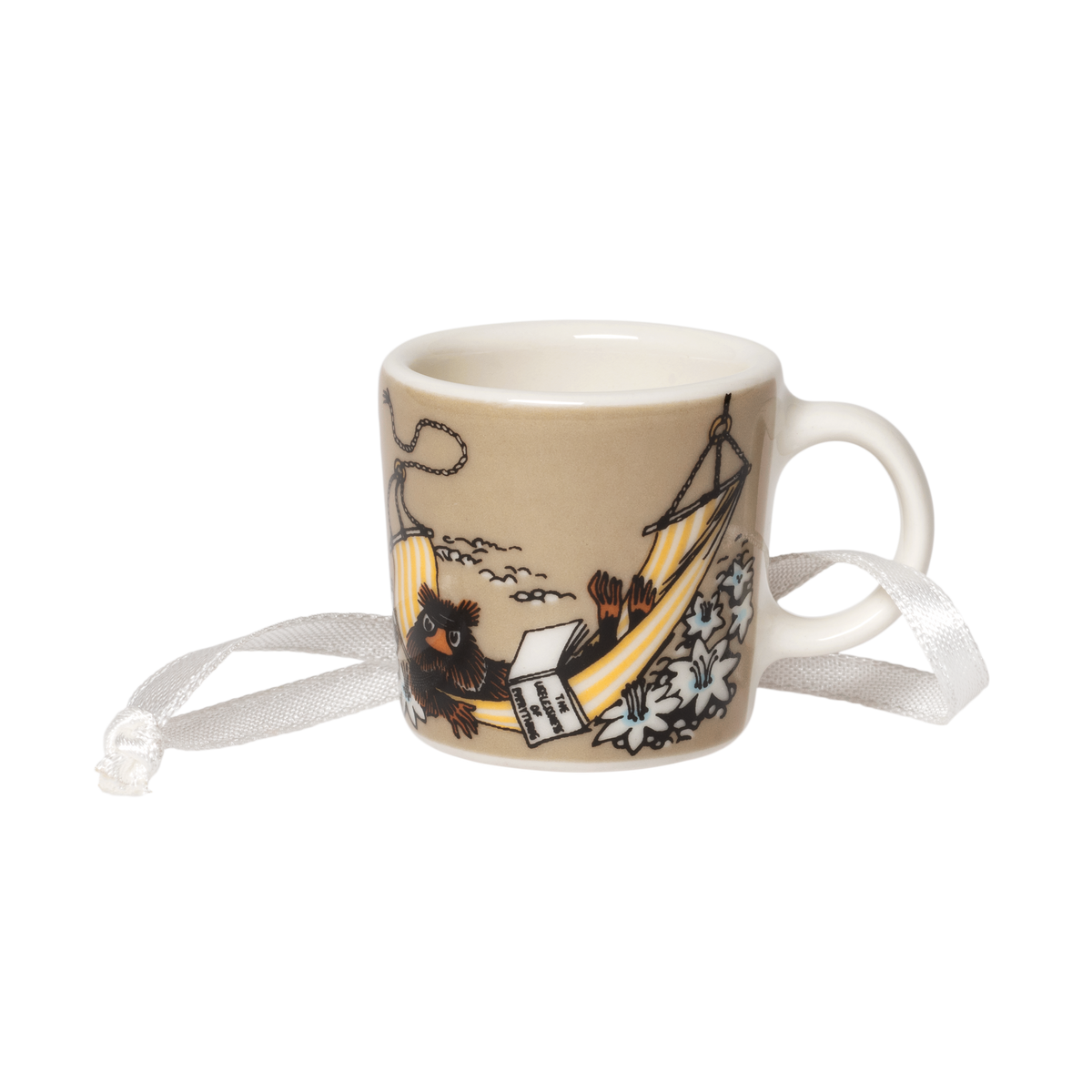 A small ceramic mini mug ornament with a white ribbon hanger, featuring a llustration of Muskrat relaxing in a hammock on a beige background.