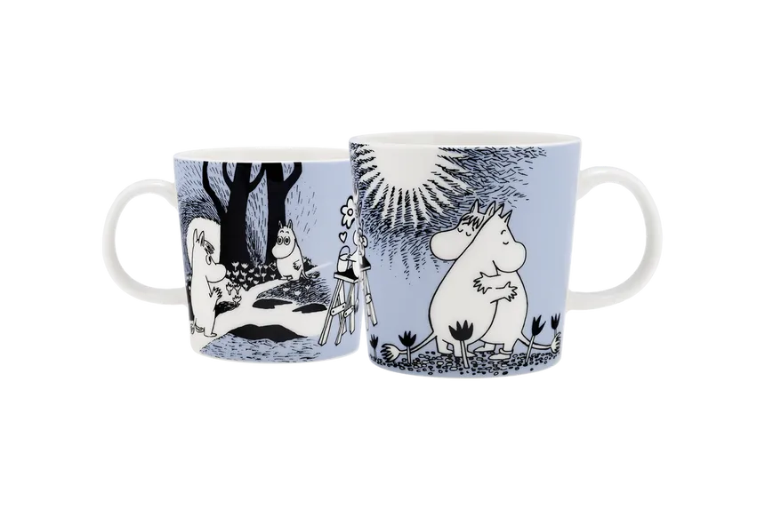 Pink light blue love mugs with Moomintroll and Snorkmaiden characters hugging in the other